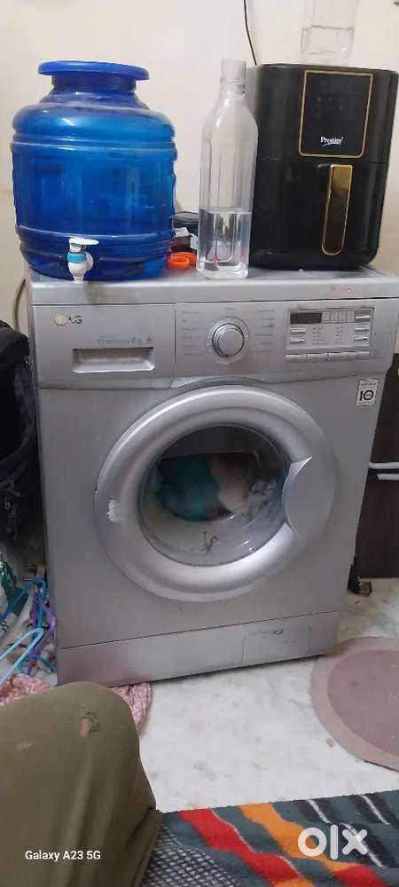 L g direct drive six k g in water washing machine front door