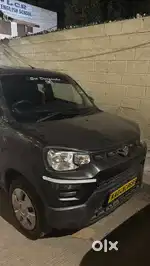 Maruti Suzuki S presso CNG fitted cab taxi. Yellow board