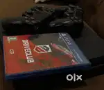 Almost new condition ps4 slim with 2 controlers and a game