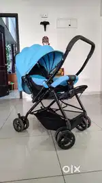 Babyhug Stroller With Reversible Handle & Mosquito Net (0 - 3 Years)