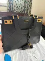 Guess Bag can be use as sling or hand bag