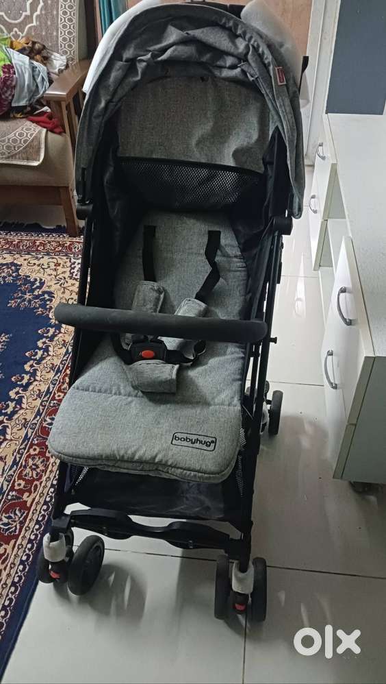 Brand New stroller and  Belltone Guiter for sale