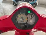 Red color Vespa scooter for sale