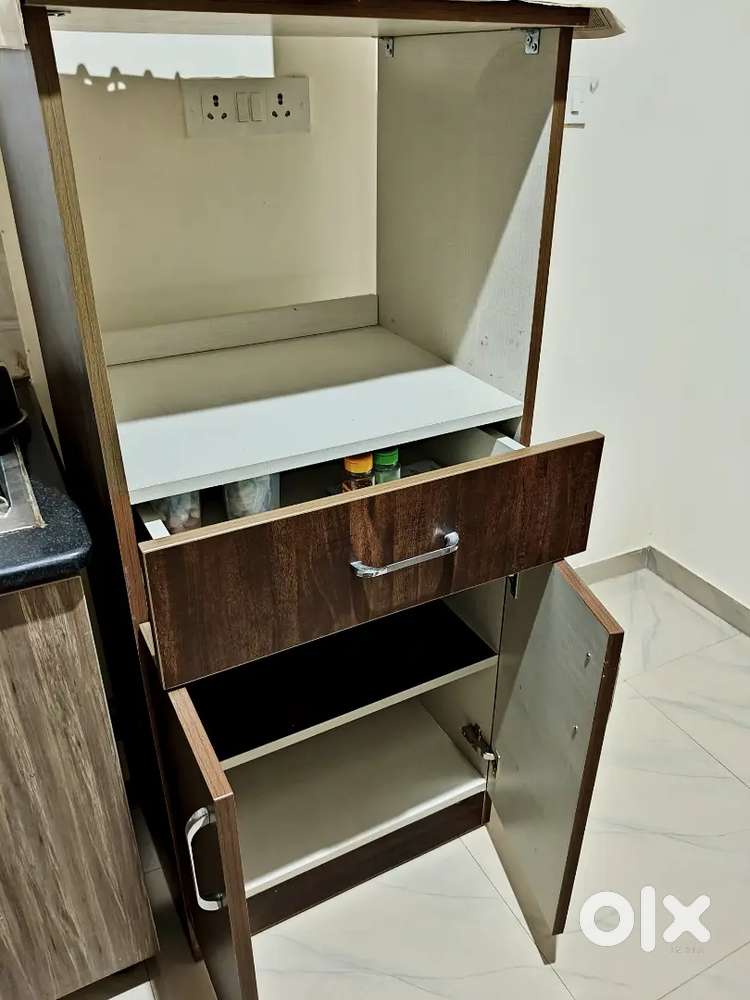 Cabinet to house Microwave oven plus general kitchen utensils