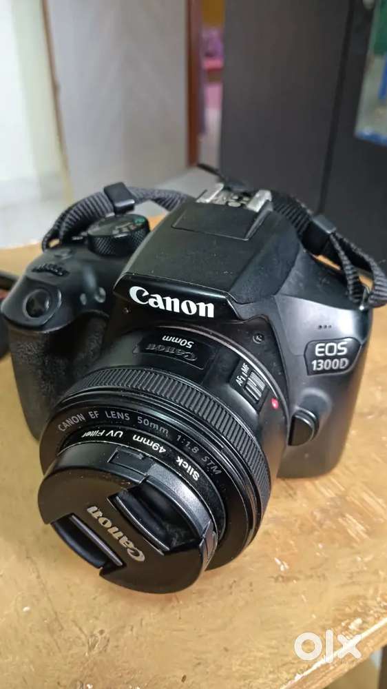 Canon 1300d argent sell full condition ok all working