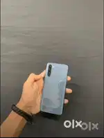 Key features include a 6.44-inch Fluid AMOLED 90 Hz d