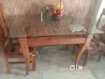 Glass top dining table 4 seater