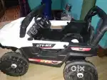Kids 4 wheeler car.