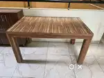 Sturdy 4-seater wooden table with laminate finish for dining or office