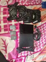 PLAYSTATION 2 WITH BROKEN JOYSTICKS