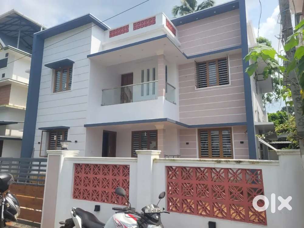 AN AMAZING NEW 4BED ROOM 2000SQ FT 5.8CENT HOUSE IN MANNUTHY,THRISSUR