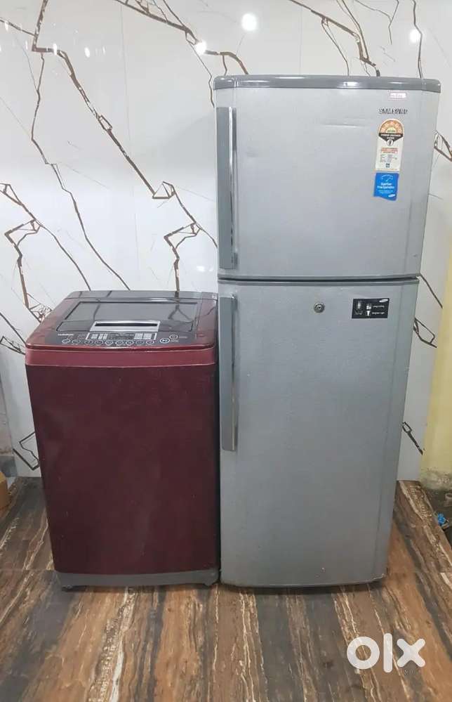 Samsung double door refrigerator nd lg top load washing machine #