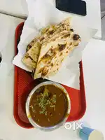 Biryani and kadhi chaval bechne ke liye cart pe khda hone ke liye