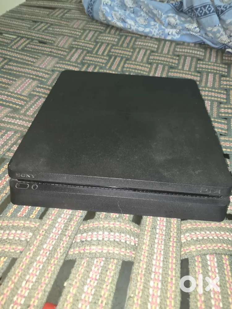 PS 4 Slim 1 TB Console with 3 controllers and 6 games whole bundle