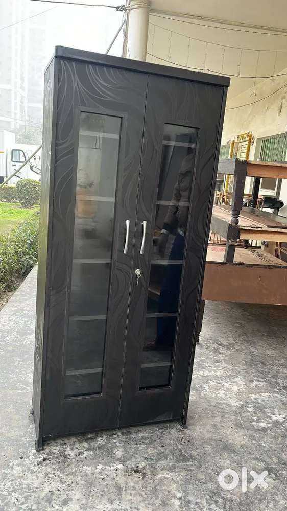 Wooden new bookshelf cum almirah 5.5 ft available.