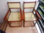 Two Burma Teak wood chairs