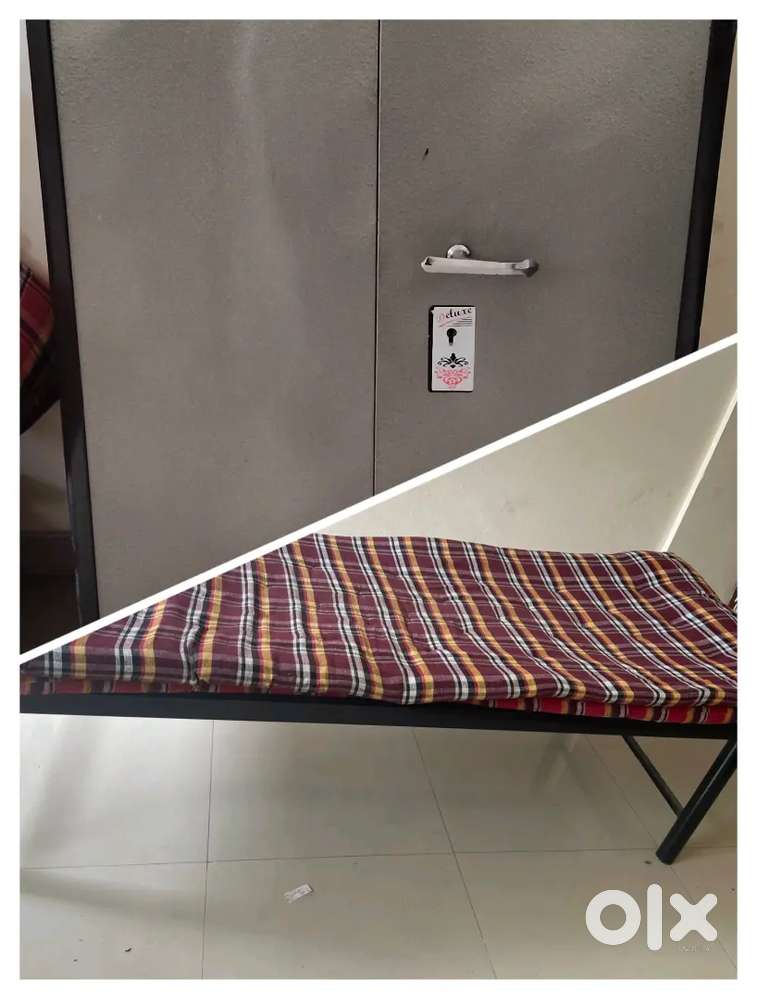 Single bed with medium size cupboard
