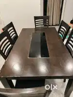Wooden polished dining table