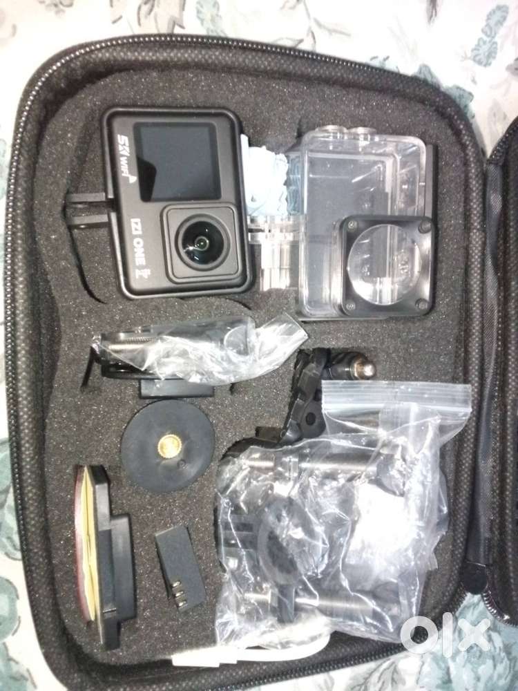 IZI ONE Plus 5K 48MP Action Camera + LG X-Boom OK55 500W Speaker.