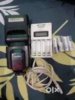 Camera flash light godex and Envie charger , battery