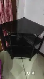 Glass corner table
