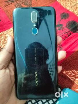 Oppo f11 4/128 fix  price with 2 back cover and data Cable no bill box