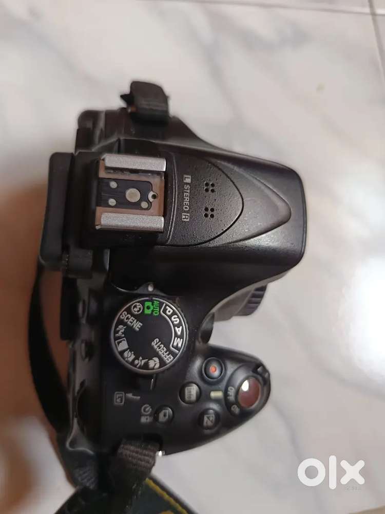 The Nikon D5200 is a DX-format DSLR camera featuring a 24.1-megapixel