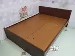 Queen size wooden bed