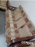 3 seater teak wood sofa negotiable