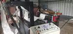 Automatic bag cutting machine