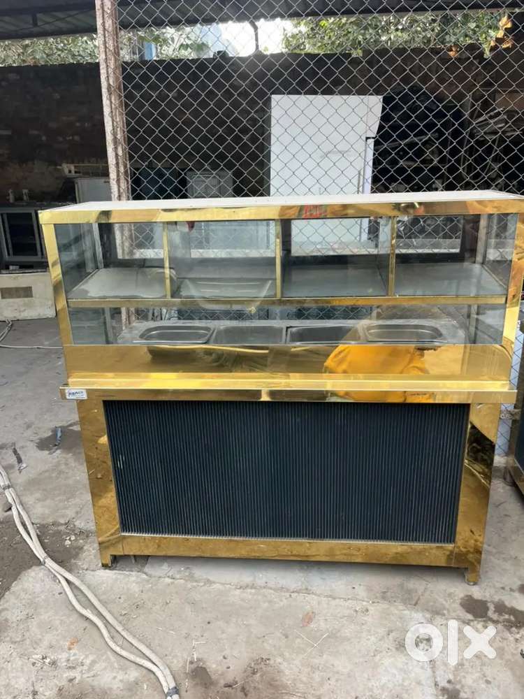 Chat counter for sale golden colour and lower down fridge  space