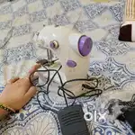 Mini electric sewing machine