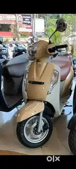Suzuki access 125 special edition in premium golden colour