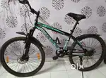 Green colour Leader cycle. Tyre size is 27.5 inch.