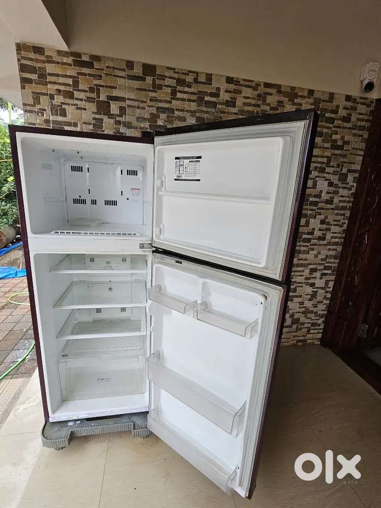Double door LG fridge and samsung top load  automatic washing Machine