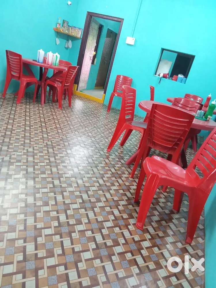Round dining table and chairs and cash counter