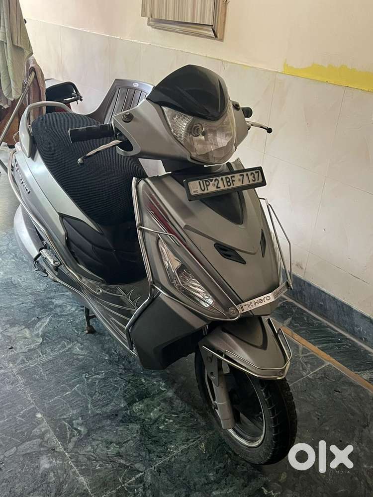 Low km, single owner- like new scooty!