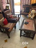 Sofa with two side sofa and center table