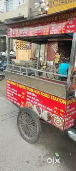 A discover bike with beautiful steel food cart