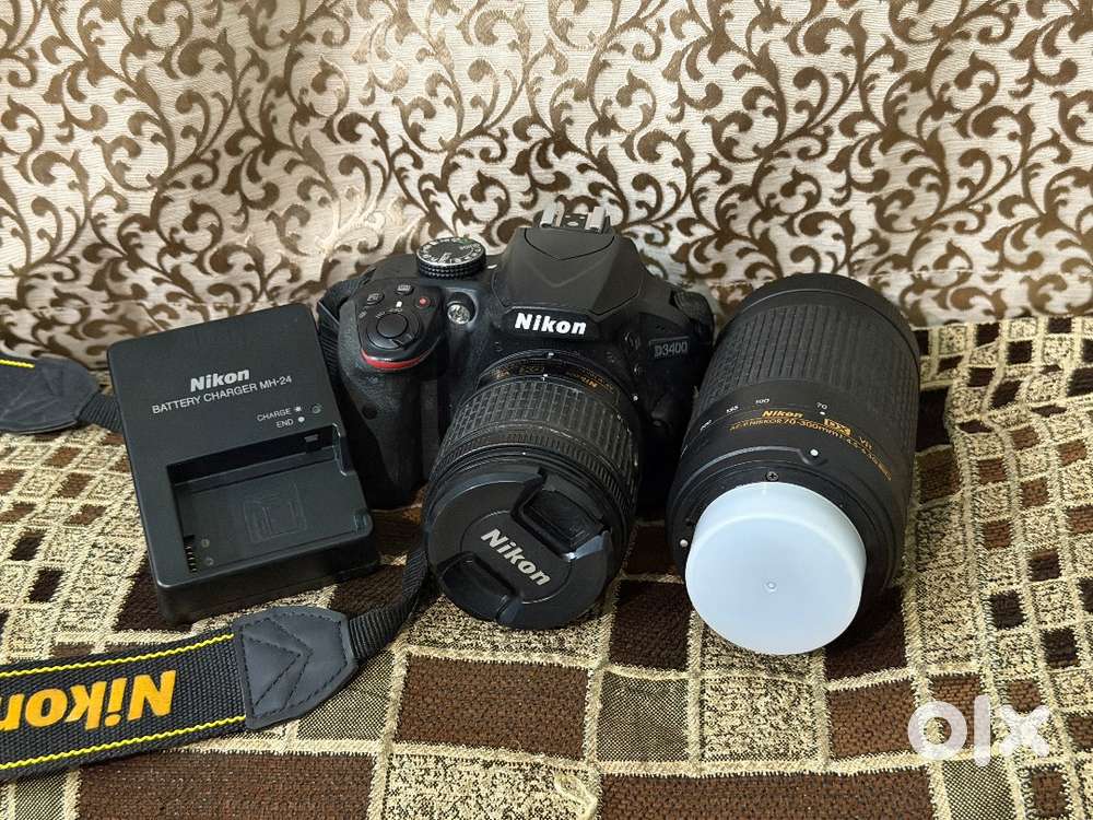 Nikon D3400 DSLR with dual lenses  for sale.