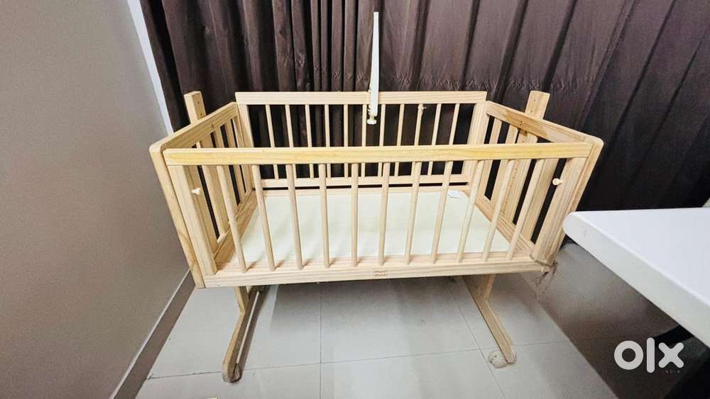 Rosewood cradle in good condition