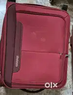 2 suitcases - 1 Samsonite and 1 American Tourister