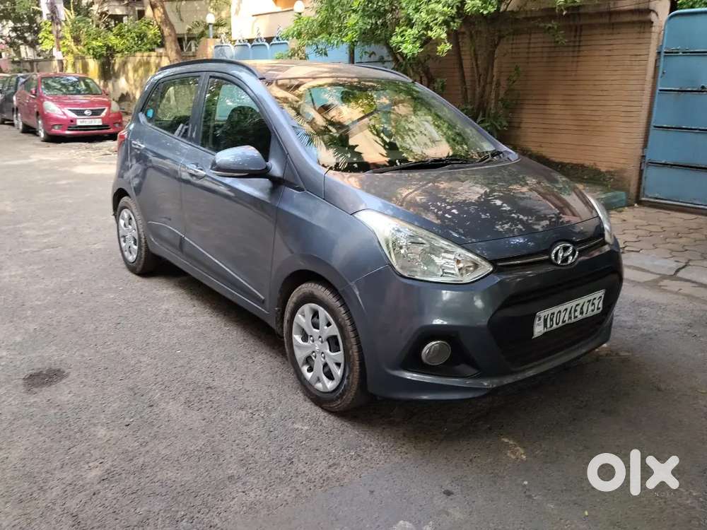Hyundai Grand i10 2013 Petrol 51000 Km Driven. Tax paid till 2028.