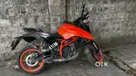 KTM Duke 390 Gen 3 for sale with helmets