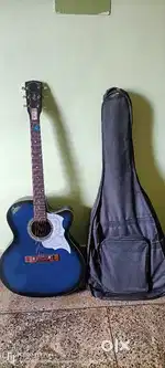 Signature acoustic guitar and used in new condition