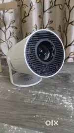 Tecsox Mini portable auto keystone projector