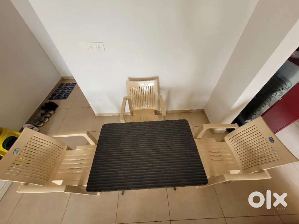 Dining Table with 4 chairs and Single Cot with 3 beds