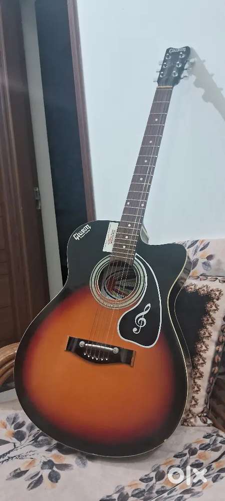 Brand new-like Barely used Guitar