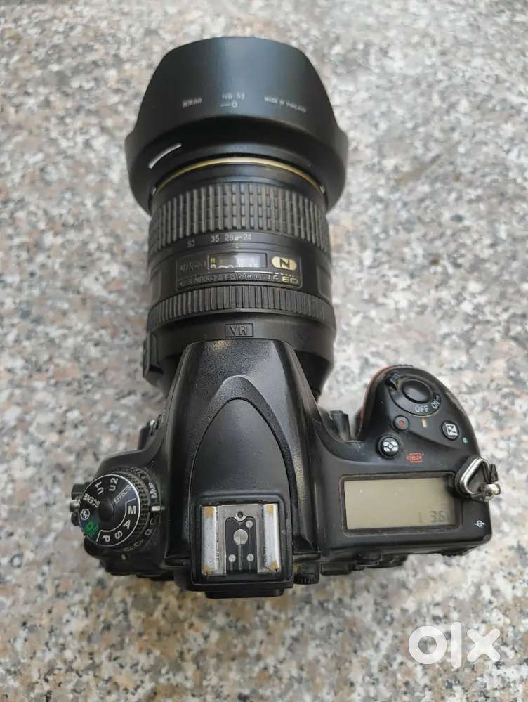 750 camera 50 mm lense original charger 2 battery