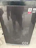 LG fully automatic 8 kg top load washing machine